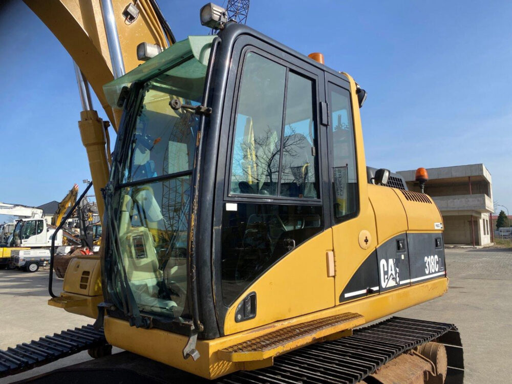 Caterpillar 318 CL rupsgraafmachine